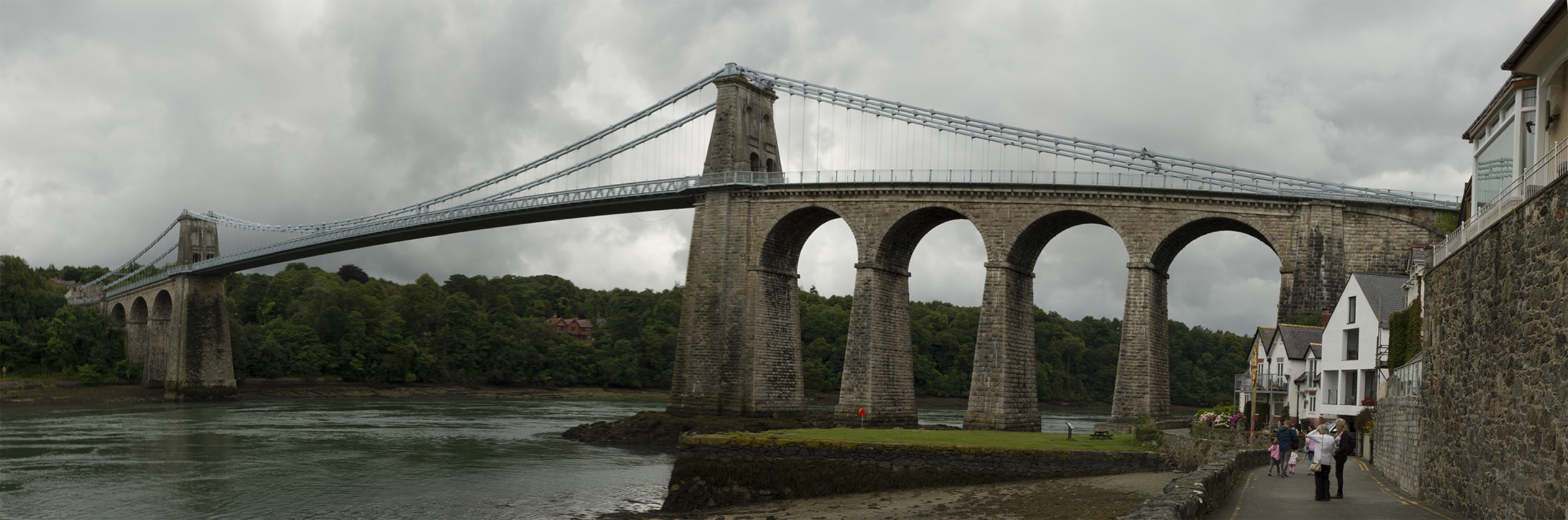 This is a panorama shot from the waterfront of the town of Menai Bridge.