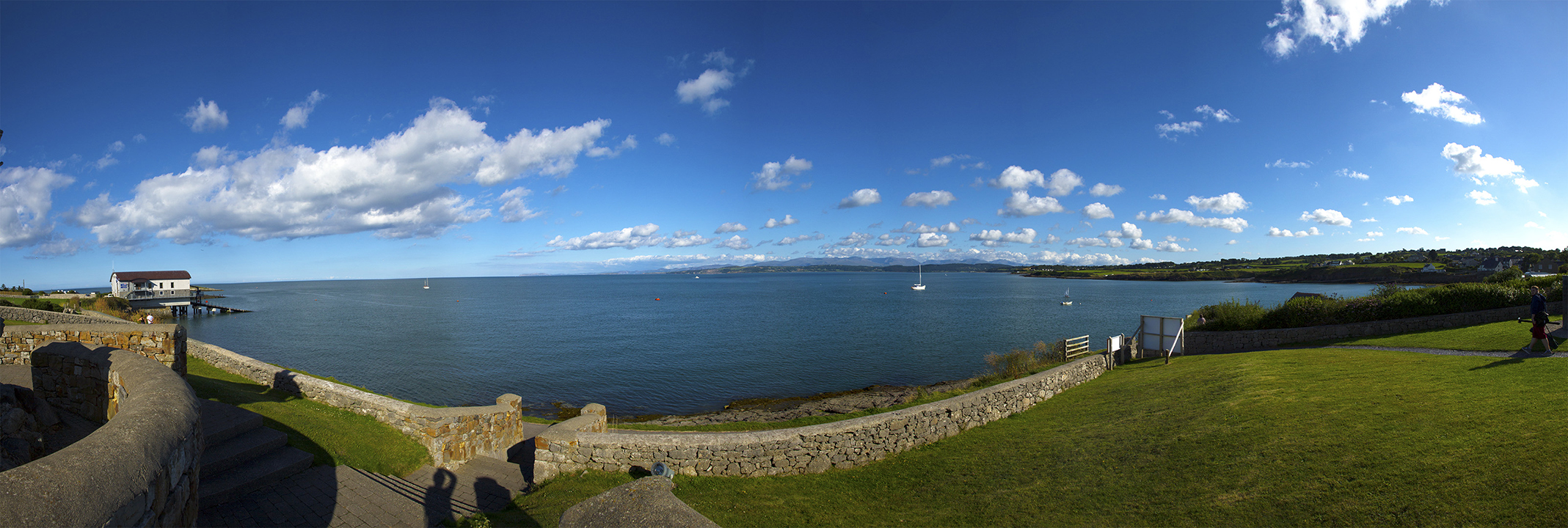 This is the same view as from Benllech, however from Moelfre a bit further up the coast. On the left is the Moelfre Lifeboat centre.